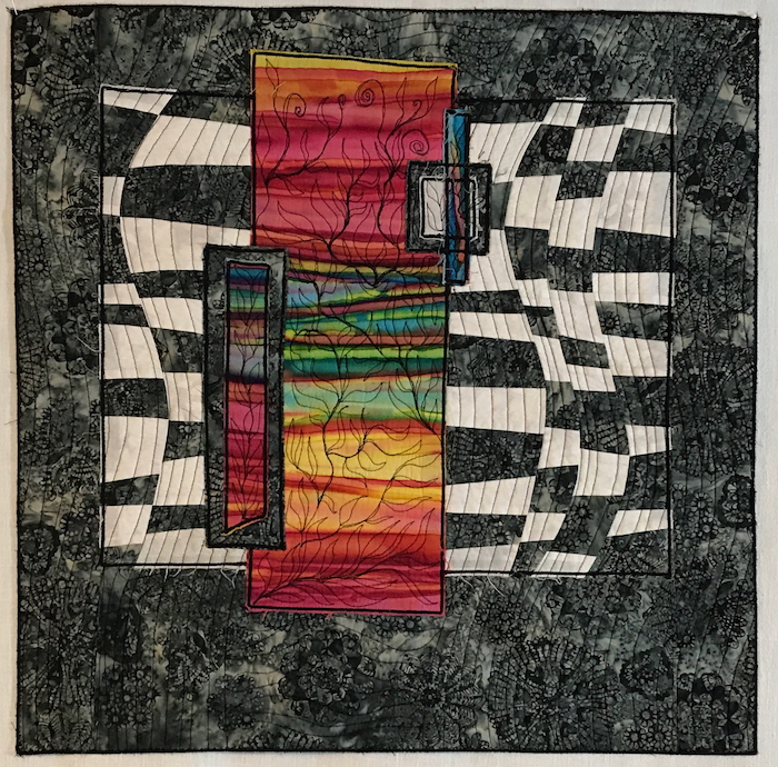 Improv art quilt with vertical rectangular rainbow